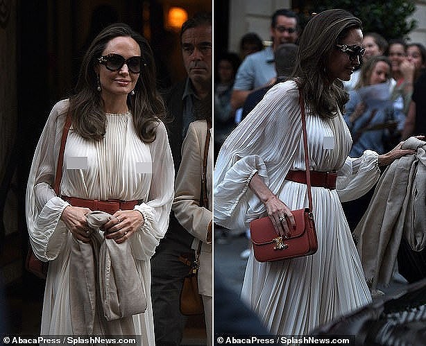 Angelina Jolie 'let loose' her breasts on the street again - photo 5