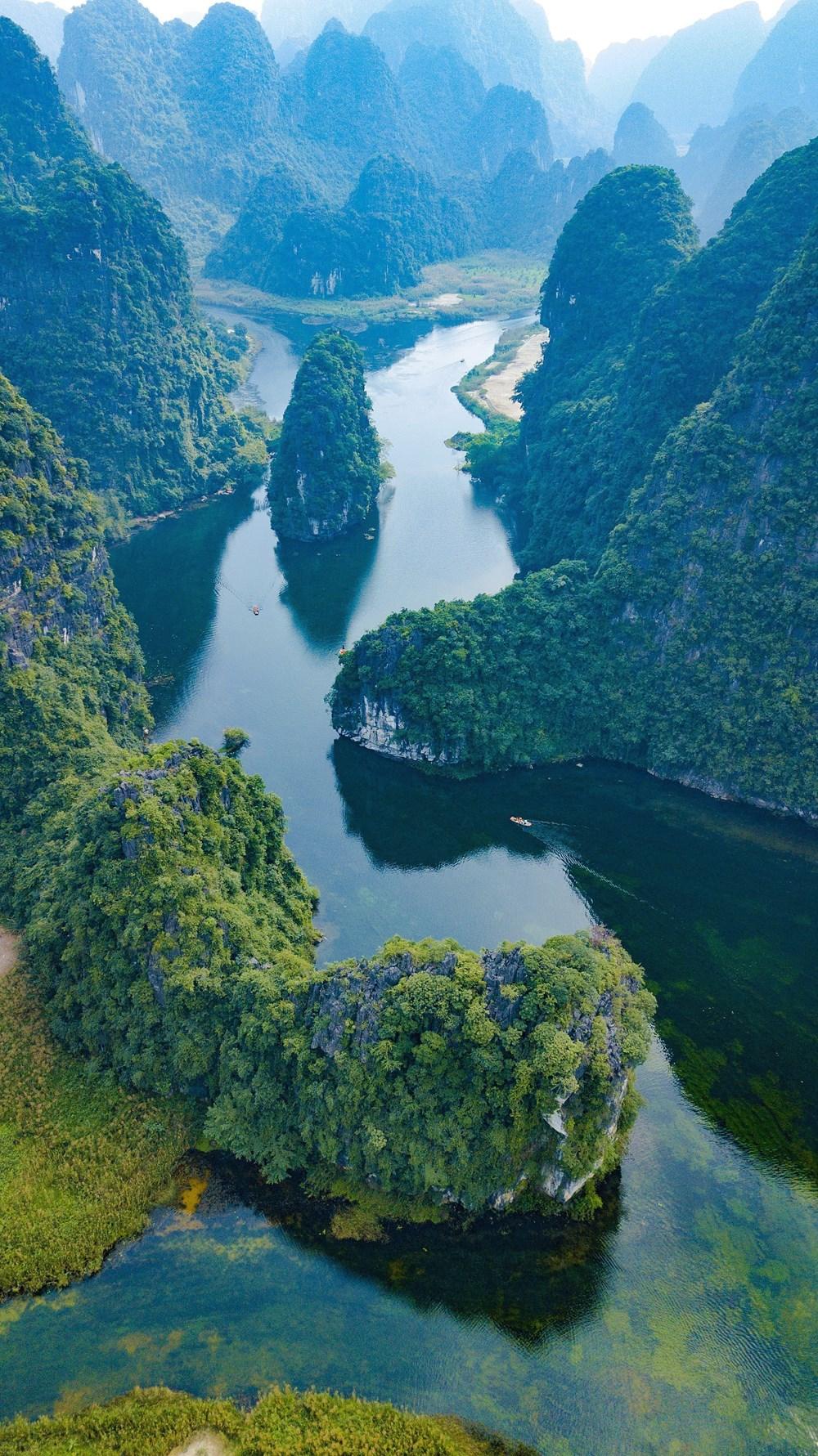 [Photo] Kham pha Ninh Binh - vung dat hap dan khach du lich hinh anh 18