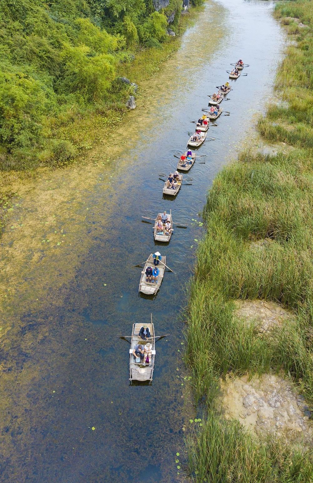 [Photo] Kham pha Ninh Binh - vung dat hap dan khach du lich hinh anh 47