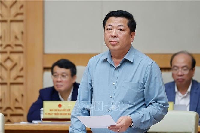 Bộ trưởng Xây dựng Trần Hồng Minh phát biểu. Ảnh: Dương Giang/TTXVN thu-tuong-phai-xu-ly-linh-hoat-hieu-qua-dam-bao-cac-muc-tieu-phat-trien-3.jpg