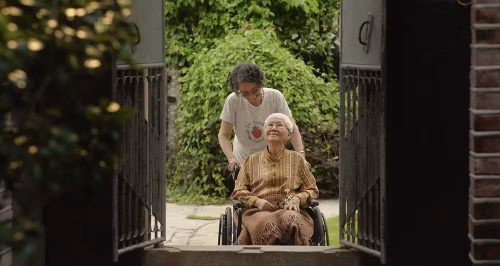 Usha Seamkhum trong "Bức thư tình gửi ngoại". Ảnh: NSX anh-man-hinh-2026-08-05-luc-090623.png
